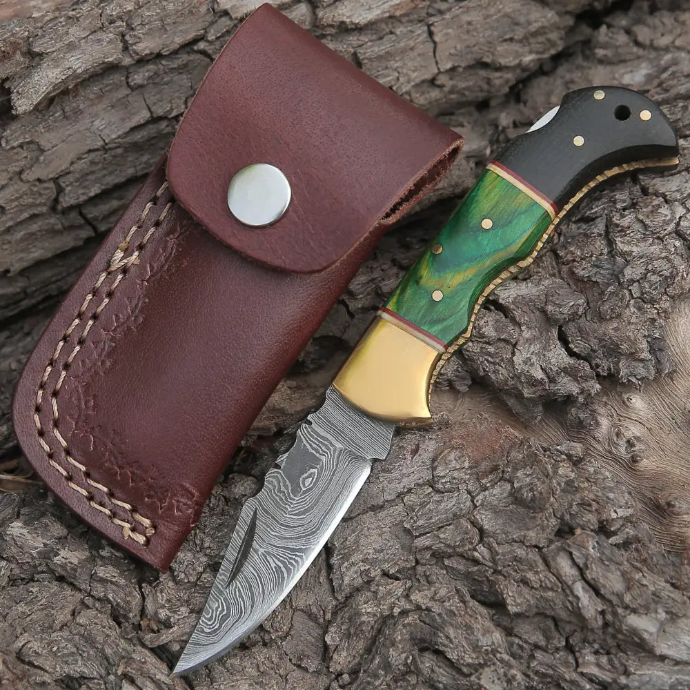 http://whitehillsknives.com/cdn/shop/files/custom-hand-forged-damascus-folding-knife-brass-bolster-with-horn-stain-wood-handle-wh-5002-813.webp?v=1686286980