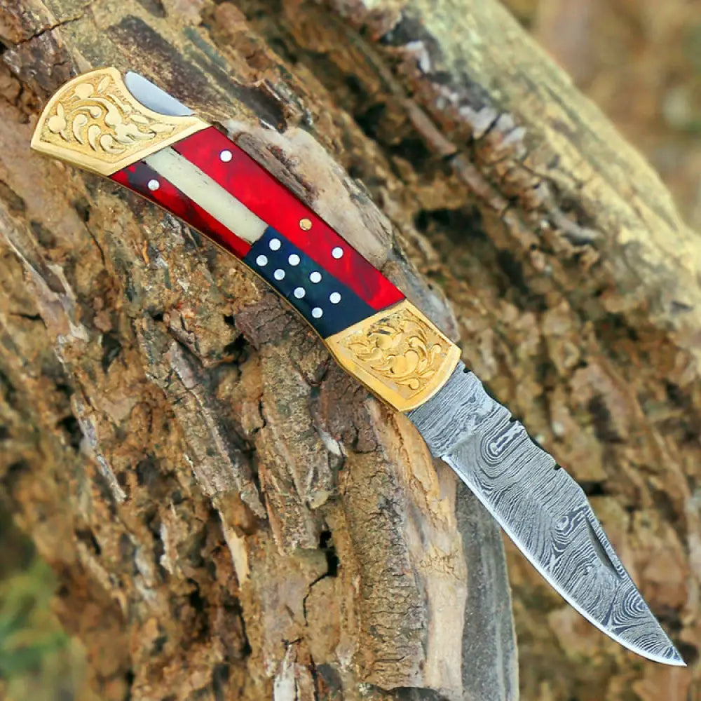 http://whitehillsknives.com/cdn/shop/files/custom-hand-made-forged-damascus-folding-knife-engraved-brass-stained-wood-handle-wh-2823-902.webp?v=1686265785