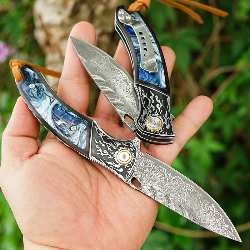 7" Handmade Damascus Pocket Knife with Pocket Clip - Resin & Ebony Wood - Flame Carved Steel Head Bolster White Hills Knives